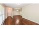 Living room with hardwood floors and neutral walls at 3141 Bellgreen Way, Decatur, GA 30032