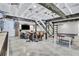 Finished basement with ping pong table, bar, and wooden stairs at 1290 Pasadena Ne Ave, Atlanta, GA 30306
