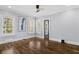 Bright bedroom with hardwood floors, large windows, and neutral paint at 1290 Pasadena Ne Ave, Atlanta, GA 30306