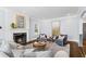Comfortable living room with a fireplace, art and neutral decor at 1290 Pasadena Ne Ave, Atlanta, GA 30306