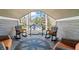 Relaxing outdoor porch with rocking chairs and decorative compass art on the floor at 1290 Pasadena Ne Ave, Atlanta, GA 30306