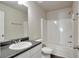 Clean bathroom with a tub, toilet, and vanity at 161 Parkview Place Dr, Mcdonough, GA 30253