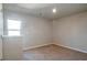 Spacious bedroom with carpet and large window at 161 Parkview Place Dr, Mcdonough, GA 30253