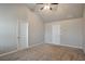 Main bedroom with vaulted ceiling, carpet, and two windows at 161 Parkview Place Dr, Mcdonough, GA 30253