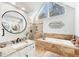 Spa-like bathroom with soaking tub, walk-in shower, and window at 275 Trowbridge Ln, Lawrenceville, GA 30043