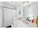 Clean bathroom with white vanity and shower at 275 Trowbridge Ln, Lawrenceville, GA 30043