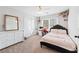 Charming bedroom with window and white dresser at 275 Trowbridge Ln, Lawrenceville, GA 30043