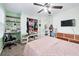 Bedroom with a queen bed, closet, and a workspace at 275 Trowbridge Ln, Lawrenceville, GA 30043