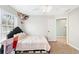 Bright bedroom with a comfortable bed and window at 275 Trowbridge Ln, Lawrenceville, GA 30043