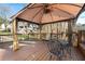 Deck with gazebo, table and chairs, offering a relaxing outdoor space at 275 Trowbridge Ln, Lawrenceville, GA 30043