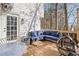 Deck with seating area and fire pit, overlooking backyard at 275 Trowbridge Ln, Lawrenceville, GA 30043
