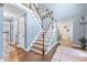 Grand entryway with hardwood floors and staircase at 275 Trowbridge Ln, Lawrenceville, GA 30043