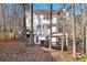 Two-story house with large deck and wooded backyard at 275 Trowbridge Ln, Lawrenceville, GA 30043