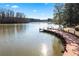 Curved wooden walkway along the lake at 275 Trowbridge Ln, Lawrenceville, GA 30043