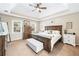 Large main bedroom with tray ceiling and sitting area at 275 Trowbridge Ln, Lawrenceville, GA 30043