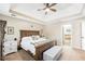 Main bedroom with king bed and ensuite bathroom at 275 Trowbridge Ln, Lawrenceville, GA 30043