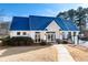Community clubhouse with blue metal roof at 275 Trowbridge Ln, Lawrenceville, GA 30043