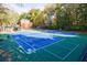 Two well-maintained tennis courts for community use at 228 Spalding Gates Dr, Atlanta, GA 30328