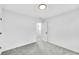 Spacious bedroom with gray carpet and access to a bathroom at 3110 Haverhill Ne Cv, Conyers, GA 30012