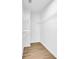Walk-in closet with wire shelving and light wood flooring at 3110 Haverhill Ne Cv, Conyers, GA 30012