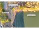 Aerial view of community amenities including docks and a basketball court at 3110 Haverhill Ne Cv, Conyers, GA 30012