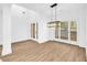 Spacious dining area with hardwood floors and chandelier at 3110 Haverhill Ne Cv, Conyers, GA 30012