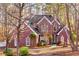 Two-story brick home with lush landscaping at 3110 Haverhill Ne Cv, Conyers, GA 30012