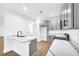 Modern kitchen with gray cabinets and quartz countertops at 3110 Haverhill Ne Cv, Conyers, GA 30012