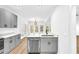 Modern kitchen with gray cabinets and quartz countertops at 3110 Haverhill Ne Cv, Conyers, GA 30012