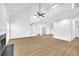Spacious living area with hardwood floors and fireplace at 3110 Haverhill Ne Cv, Conyers, GA 30012