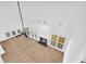 High-ceiling living room with fireplace and wood flooring at 3110 Haverhill Ne Cv, Conyers, GA 30012