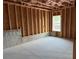 Unfinished basement with insulation and framing, ready to be customized at 5043 Baywood Ln, Woodstock, GA 30188