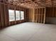 Spacious unfinished basement with natural light, awaiting your personal touch at 5043 Baywood Ln, Woodstock, GA 30188