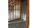 Unfinished basement with visible framing and plumbing ready for customization at 5043 Baywood Ln, Woodstock, GA 30188