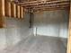 Awaiting your personal touch is an unfinished basement with exposed ceiling at 5043 Baywood Ln, Woodstock, GA 30188