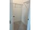 Walk-in closet with shelving and neutral carpet flooring at 5043 Baywood Ln, Woodstock, GA 30188