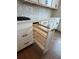 Kitchen cabinets featuring a pull-out spice rack at 5043 Baywood Ln, Woodstock, GA 30188
