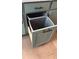 Modern kitchen cabinet featuring a pull-out trash receptacle at 5043 Baywood Ln, Woodstock, GA 30188