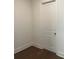 Bedroom features hardwood floors and a white door at 5043 Baywood Ln, Woodstock, GA 30188