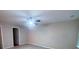 Simple bedroom with ceiling fan and carpet at 6636 Saint Jude Dr, Fairburn, GA 30213