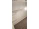 Closet with wire shelving and chandelier at 6636 Saint Jude Dr, Fairburn, GA 30213