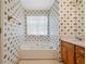 Bathroom with garden tub, shower, and floral wallpaper at 1215 Brook Meadow Ct, Lawrenceville, GA 30045