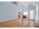 Bright dining area with hardwood floors and access to rear deck at 1215 Brook Meadow Ct, Lawrenceville, GA 30045