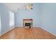 Living room with vaulted ceiling, fireplace and hardwood floors at 1215 Brook Meadow Ct, Lawrenceville, GA 30045