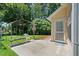 Concrete patio with arbor and partial privacy at 1215 Brook Meadow Ct, Lawrenceville, GA 30045