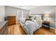 Comfortable bedroom with a plush bed, hardwood flooring, and ample natural light at 2732 Suwanee Se Way, Marietta, GA 30067