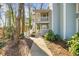 Charming blue townhouse with inviting front porches and well-maintained landscaping at 2732 Suwanee Se Way, Marietta, GA 30067