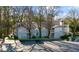 Charming condo exterior featuring a light blue facade, trimmed balconies, and a well maintained parking area at 2732 Suwanee Se Way, Marietta, GA 30067