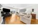 Spacious living room featuring hardwood floors, modern decor, and a comfortable seating arrangement at 2732 Suwanee Se Way, Marietta, GA 30067