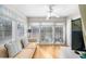 Bright and sunny sunroom with ample natural light, comfortable seating, and scenic outdoor views at 2732 Suwanee Se Way, Marietta, GA 30067